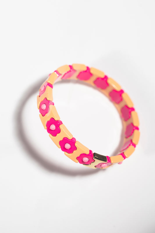 Peach and hot pink floral bracelet with small pink centers, angled view showing 3D design and shadow